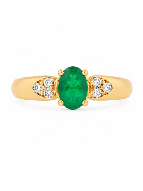 Bague en or jaune sertie de diamants et d’une émeraude