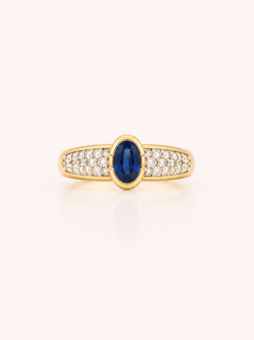 Bague en or bicolore sertie d’un saphir et de diamants - Les Amoureux au Kiosque Peynet